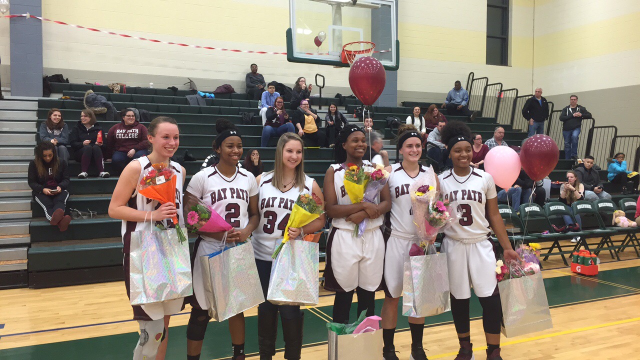 Jackson Scores 1,000th Point Leading Wildcats to a Senior Night Victory